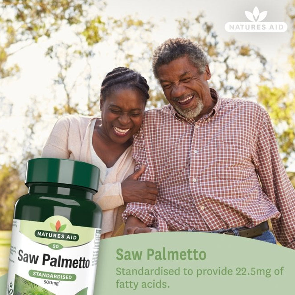 Couple standing outdoors with a bottle of Natures Aid Saw Palmetto in the foreground.