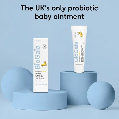 Biogaia probiotic baby ointment packaging on a blue background