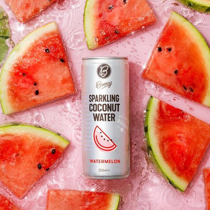 Can of Bonaire Sparkling Coconut Water surrounded by watermelon slices on a pink background