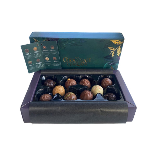 a display of decorated chocolates by the  Chocolate Garden Chocolate Box 