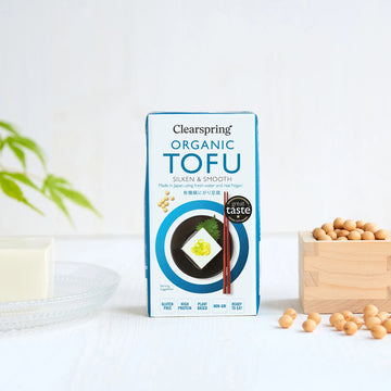 Clearspring Organic Tofu packaging with tofu and beans on a light background