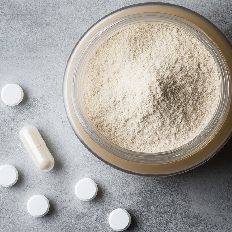 Bowl of creatine on a gray surface with tablets around