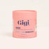 A pink cylindrical container of Gigi Advanced Pre-Conception & Pregnancy Blend dietary supplement.