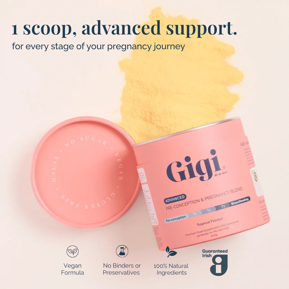 A pink tub of Gigi Pre-conception &amp; Pregnancy Blend supplement with its lid placed beside it with a yellow powder.