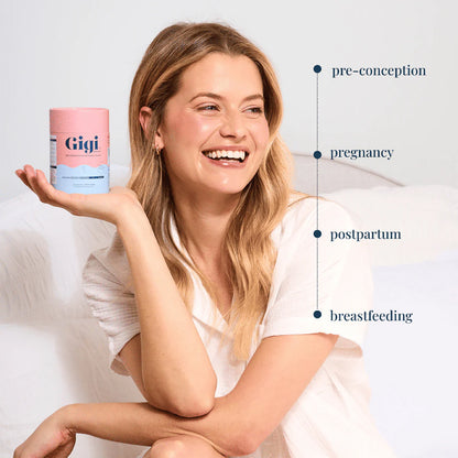 Woman holding a container labeled &
