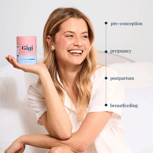 Woman holding a container labeled &