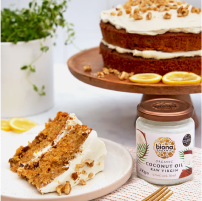 Biona Coconut Oil jar with cake in background