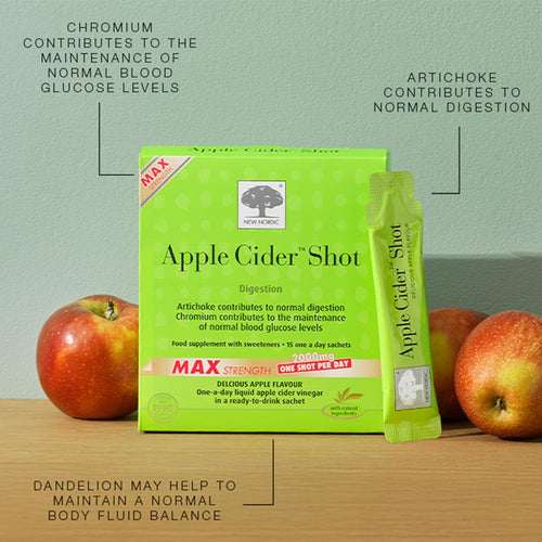 Green Apple Cider Shot packaging with an apple on a wooden surface