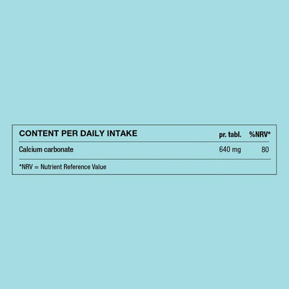 Nutritional label for calcium carbonate tablets on a light blue background