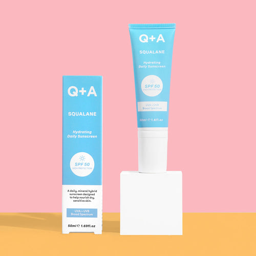 Q+A Squalane SPF 50 Hydrating Daily Sunscreen with colourful background