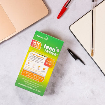 Revive Active Teen Revive Tropical Flavour with pen and paper