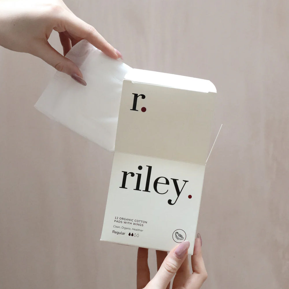 Person holding a package of &