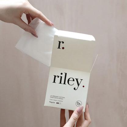 Person holding a package of &
