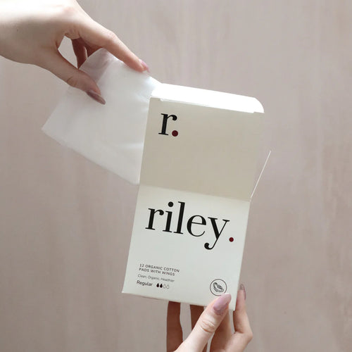 Person holding a package of &