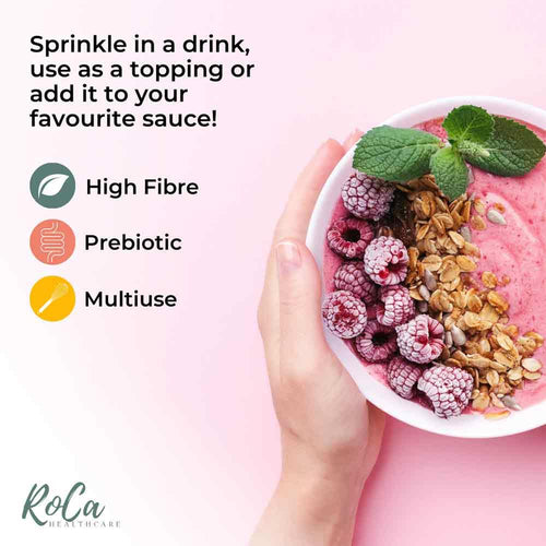 A hand holds a white bowl filled with pink smoothie, topped with fresh raspberries, mint leaves, and granola. Text on the left explains how to use the product: &