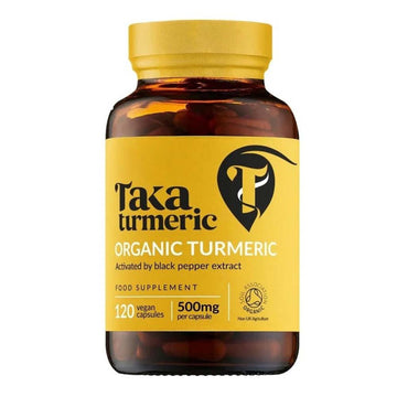 A bottle of Taka Turmeric Organic Turmeric food supplement, 500mg, containing 120 vegan capsules, on a solid white background.