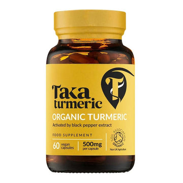 A bottle of Taka Turmeric Organic Turmeric food supplement, 500mg, containing 60 vegan capsules, on a solid white background.