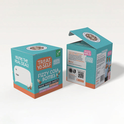 Two product boxes for Fizzy Cola Bottles plant-based sweets, shown on a clean off-white studio background.