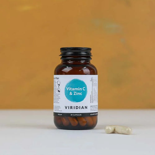 Brown supplement bottle labeled &