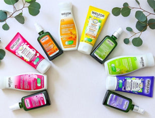 rainbow display of Weleda skincare products