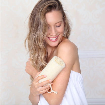 woman using Daily Concepts Daily Body Loofah